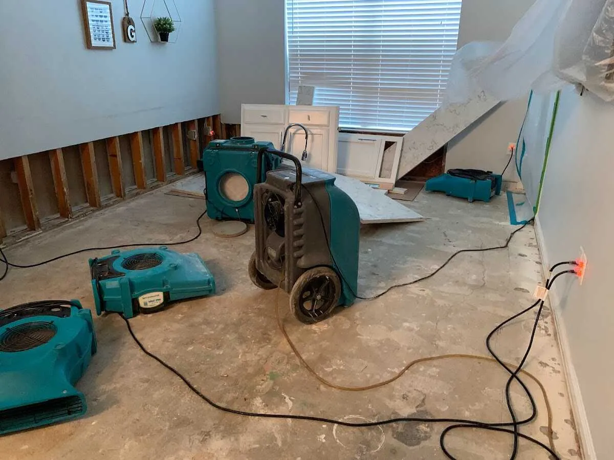 Dehumidifier in flood-cut room for Water Damage Restoration in Jacinto City