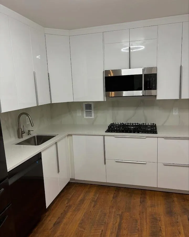 Restored kitchen with white cabinets after water damage in Jacinto City
